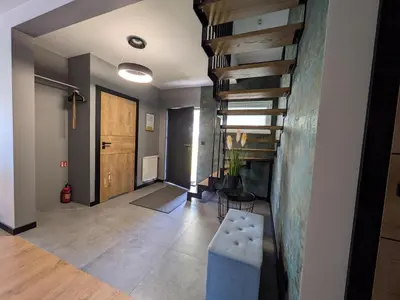 a bedroom with a sliding door to a closet at Chill House in Zator
