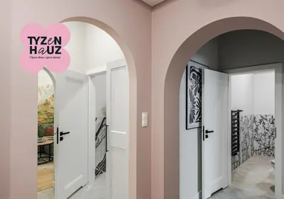 a hallway with an archway in a room at Kaleidoscope Apartment by Tyzenhauz in Kraków