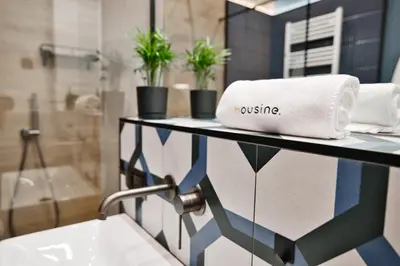 a bathroom with a sink and a towel on a shelf at Flower Blue 2 by Housine in Zator