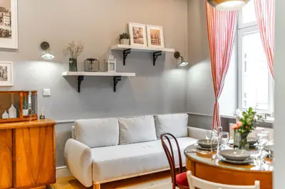 a living room with a couch and a table at Kraków Kazimierz - Top Location, Entresol - by Rentujemy in Kraków