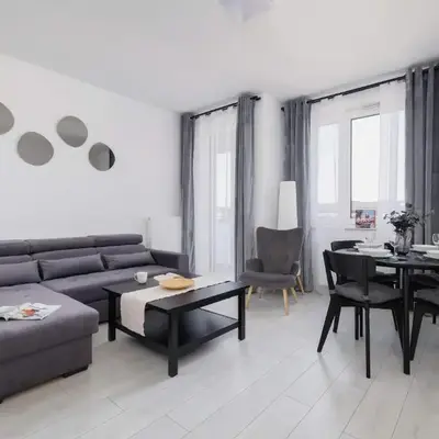 Fabryczna Modern Apartment with Balcony & Parking in Cracow by Noclegi Renters