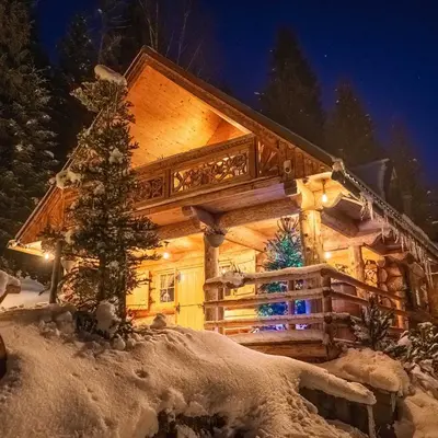 a log cabin in the snow at Leśna Bacówka in Nowy Targ