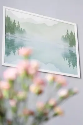 a picture of flowers in front of a picture of a lake at ANTA Apartments Warszawska in Kraków