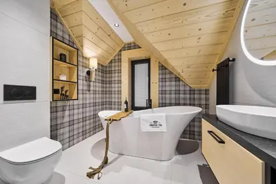 a bathroom with a white tub and a sink at Arete' 710 Stryszawa in Stryszawa