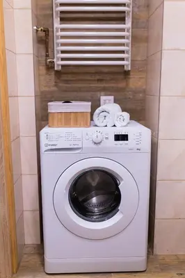 a washer and dryer in a small room at Przytulny Apartament w centrum Rabki in Rabka