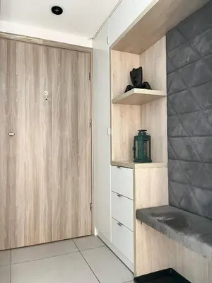a room with a closet with wooden cabinets at Modern Apartments with Air Conditioning, Vistula Boulevards, Cracow city heart in Kraków