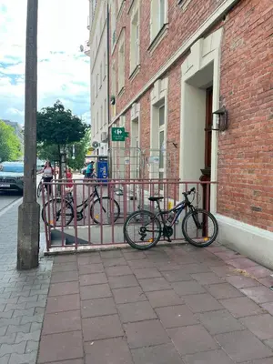 a group of bikes parked next to a building at Modern Apartments with Air Conditioning, Vistula Boulevards, Cracow city heart in Kraków