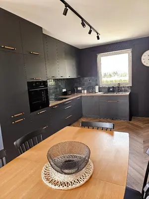 a kitchen with a table with a bowl on it at Willa za Zeliną