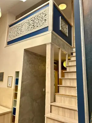 a staircase in a house with blue and white at Vintage Studencka 25 Apartment in Kraków