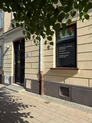 a building with a window on the side of it at Szlak Loft in Kraków