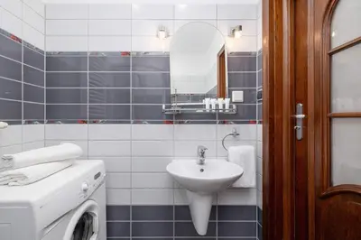 a bathroom with a sink and a mirror at Krupnicza Family Studio with AC Quiet Krakow Old Town by Noclegi Renters in Kraków