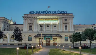 a large building with a sign on top of it at Ekskluzywny apartament, Browar Lubicz, FREE Parking in Kraków