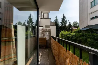 a view from the balcony of a house at Riverside Comfort Apartment by BookingHost in Kraków