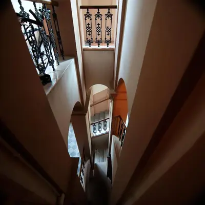 an overhead view of a staircase in a building at Rose & Thyme Artisan Studio in Old Town in Kraków