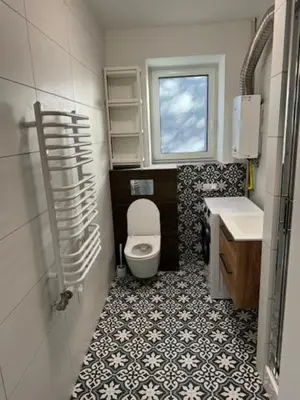 a small bathroom with a toilet and a sink at Niepołomice, nocleg,noclegi,dla firm,dom, pokoje in Niepołomice