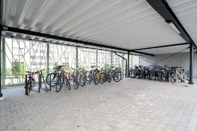 a bunch of bikes parked in a building at Bohomolca Chic Studio with Garden by BookingHost in Kraków