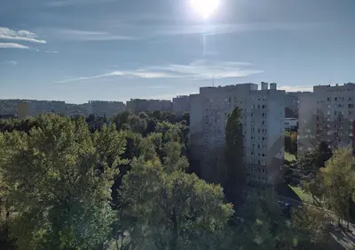 an overhead view of a city with buildings and trees at Cracowapart Sunny Point in Kraków