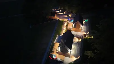 an overhead view of a house at night with lights at Leśna Enklawa pod Wielką Górą in Pisarzowa