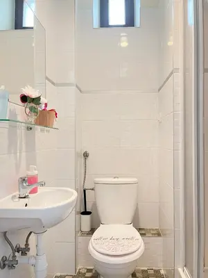 a shower with a glass door in a bathroom at Smart Studio for 3 guests 8 min to Main Square in Kraków