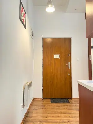 a bathroom with a sink and a mirror at Smart Studio for 3 guests 8 min to Main Square in Kraków