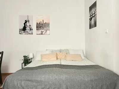 a white bathroom with a sink and a mirror at Smart Studio for 3 guests 8 min to Main Square in Kraków