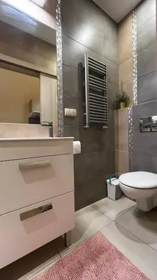a bathroom with a toilet and a sink at Studio in Kraków Center in Kraków