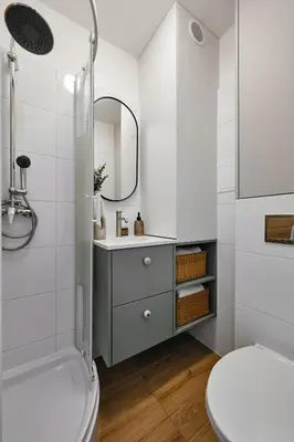 a bathroom with a shower and a toilet and a sink at UR4N Apartment - Konarskiego in Kraków