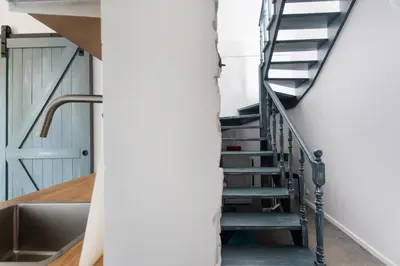 a staircase in a house with a sink at Carlson near Enerdgylandia in Zator