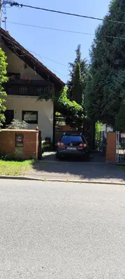 a car parked in the driveway of a house at Za Rabą Nowy in Myślenice
