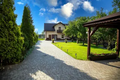 a driveway leading to a house with a pavilion at Jurajska47 - trójka in Wola Kalinowska