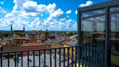 a view of the city from a balcony at Długa 17 Residence in Kraków