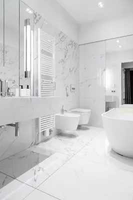 a white bathroom with two sinks and a tub at Househost Apartment Bogusławskiego 76 in Kraków