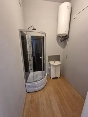 a bathroom with a shower and a sink at Fantastic-Inn Kraków - KR63 in Kraków