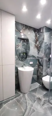 a bathroom with a sink and a toilet in it at Wieliczka Apartment in Czarnochowice