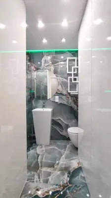 a bathroom with a sink and a toilet at Wieliczka Lux Park in Czarnochowice