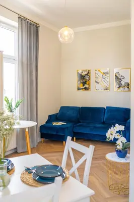 a kitchen with a laptop sitting on a counter at Art Deco Elegance in Kraków