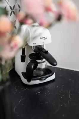 a coffee maker sitting on top of a counter at Historic Hideaway - Podgórze - by Upstairs in Kraków
