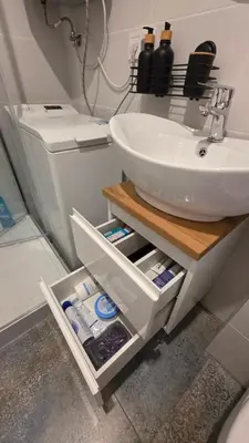 a bathroom with a sink and a toilet at Apartament Boho 23 in Kraków
