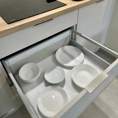 two pots and pans in a drawer in a kitchen at Apartment Chrzanòw in Chrzanów