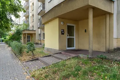 a building with a door on the side of it at Grzegórzki Chic Studio by BookingHost in Kraków