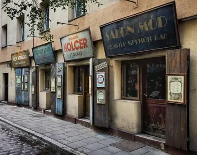 a building with many signs on the side of it at Ekskluzywny apartament w centrum, Balkon in Kraków