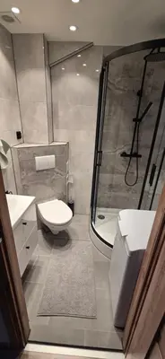 a bathroom with a shower and a toilet and a sink at W Rabczańskiej Dolinie in Rabka