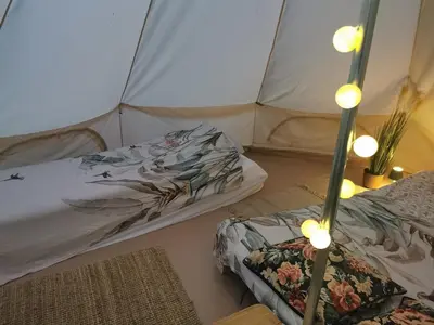 a room with two beds in a tent at Hope Mountain Escape Poland, Awesome Glamping Tent in Szczawa