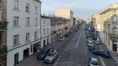 a view of a city street with cars parked at Kalwaryjska Elegant Stay Studios by BookingHost in Kraków