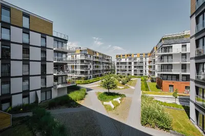 an aerial view of an apartment complex with buildings at City Dreams Apartment in Kraków