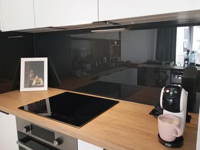 a picture on a kitchen counter with a coffee cup at K Everhome in Kraków