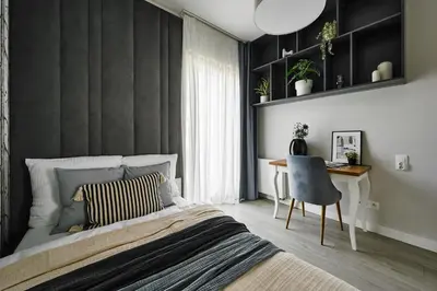 a bedroom with a bed and a desk and a chair at Velvet Dreams Apartments 46 in Kraków