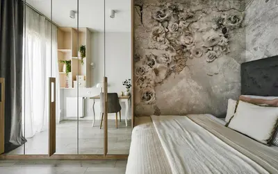 a bedroom with a bed and a wall mural at Velvet Dreams Apartments 49 in Kraków