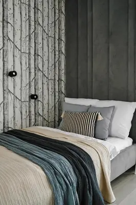 a bedroom with a bed with trees on the wall at Velvet Dreams Apartments 49 in Kraków
