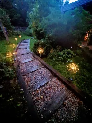 an overhead view of a set of train tracks at night at Agroturystyka Z Głową w Chmurach - Zawoja in Zawoja